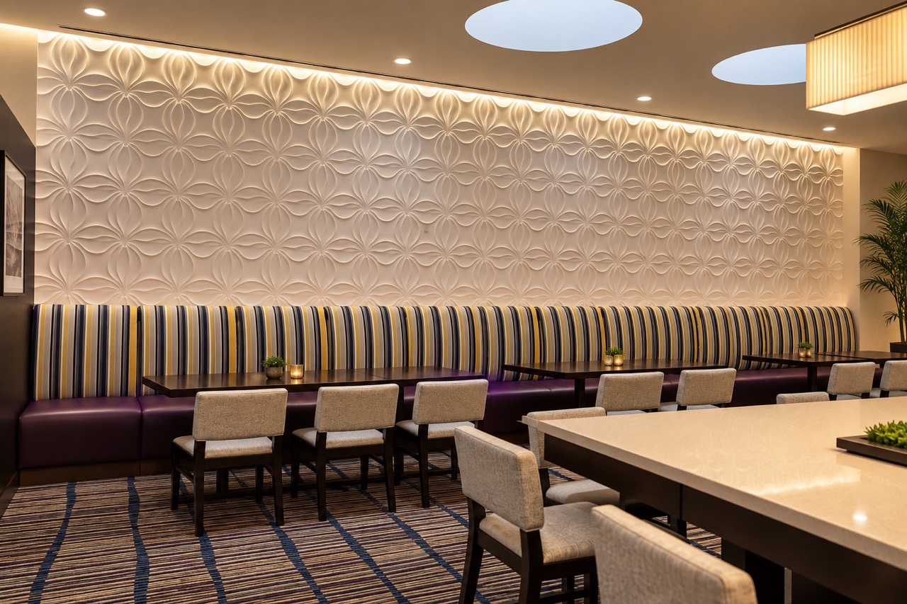 Custom striped banquette upholstery in a modern hotel restaurant lounge